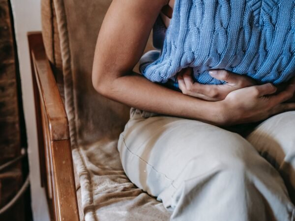 woman suffering from a stomach pain