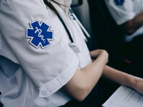 paramedics sitting in an ambulance